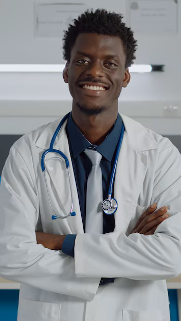 Doctor caring for a patient at Triumph Hospital and Maternity Nigeria